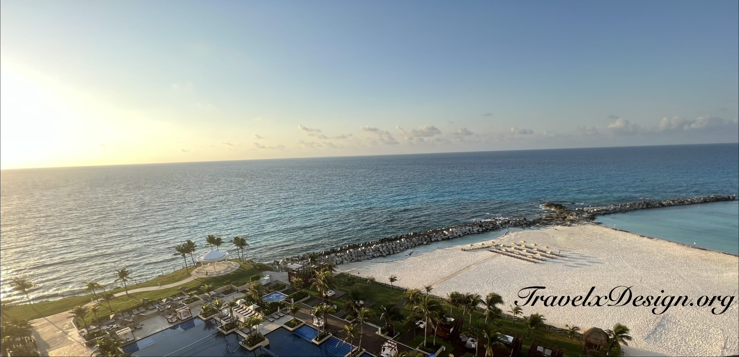 Cancun with logo